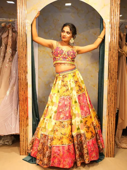 Your bridesmaids and guests deserve to shine too. This vibrant, multi-colored lehenga is perfect for a fun Mehendi or Sangeet function, showing that I have gorgeous options for the entire wedding crew.