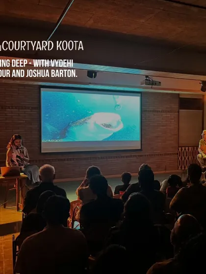 A screening and discussion in progress for "Diving Deep," a dialogue on exploring our oceans with Vydehi Kadur and Joshua Barton.