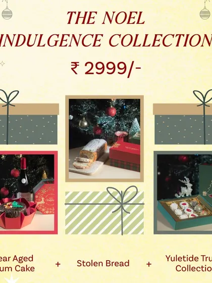 The Noel Indulgence Collection is one of my premium Christmas hampers, featuring a Year-Aged Plum Cake, Stollen Bread, and the Yuletide Truffle Collection.