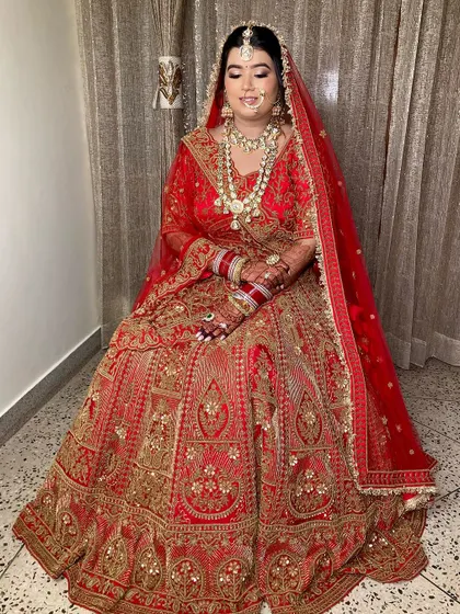 Sonakshi looked so glowing and ethereal. I loved dolling her up in this classic red lehenga, creating a look that was both traditional and radiant.