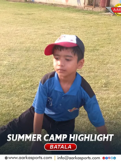 A young player takes a break during a strenuous summer camp session. We teach the importance of both hard work and rest.
