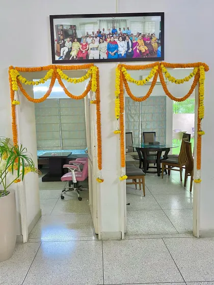Simple marigold flower torans and garlands on doorways are perfect for creating a festive atmosphere inside the house. This is a classic decoration for any pooja or tyohaar.