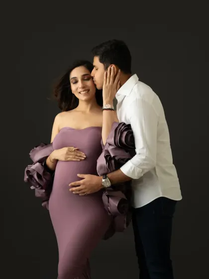 Capturing the tender interactions between a couple. This gentle touch and happy expression make for a beautiful and authentic fine art maternity portrait.