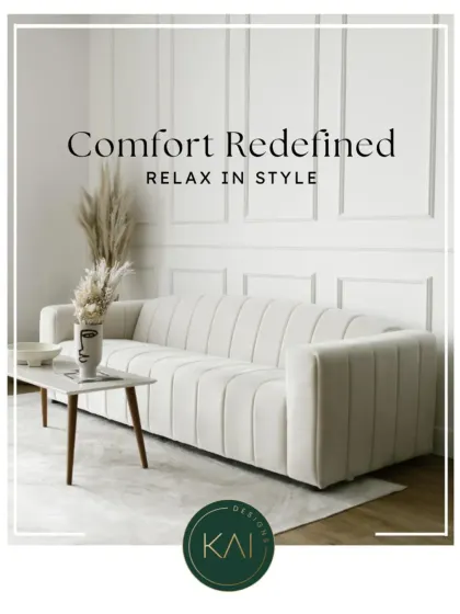 This elegant white sofa features vertical channel tufting and a clean, armless design, reflecting a modern and refined aesthetic. It was created as part of a bespoke furniture package for a luxury residence.