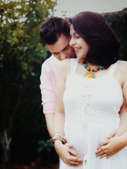 A maternity session is a celebration of the journey you are on together. This image captures the quiet intimacy and anticipation between expecting parents in a natural, outdoor setting.