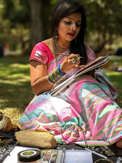 This is me in my happy place, painting outdoors. Creating art isn't just a job; it's how I connect with the world and myself. Every piece I make is filled with the peace and joy I feel in moments like this.