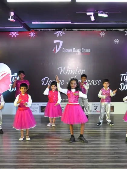 A final pose from our adorable grooming kids at the Winter Dance Showcase.
