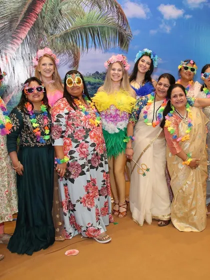 More happy guests enjoying the Hawaiian party. A great theme and fun props are the perfect recipe for memorable photos and a fantastic time.