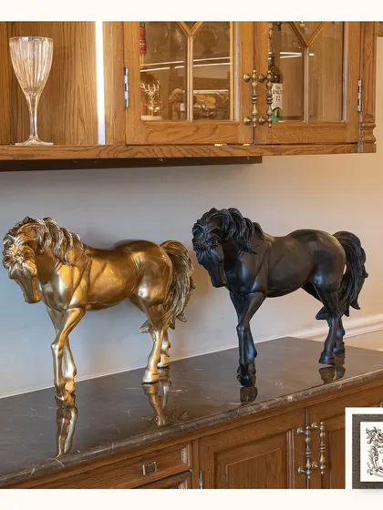 These exquisite gold and black horse sculptures add a touch of luxury and sophistication to any setting. I find they work beautifully on a sideboard or console to create a stunning focal point.
