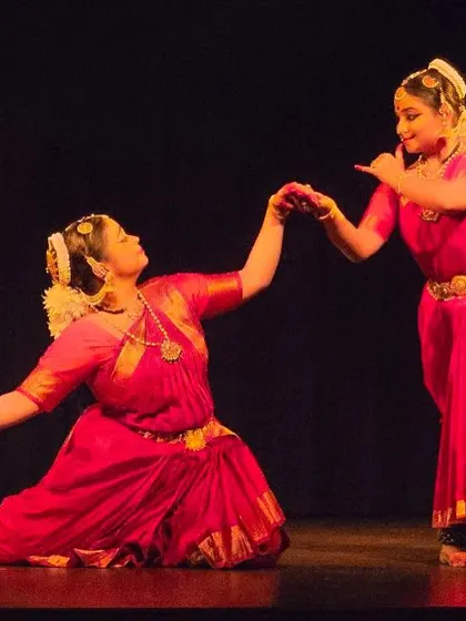 An interactive moment between two dancers during our ICCR recital. Even in a group setting, I choreograph moments that highlight individual interactions and emotions.