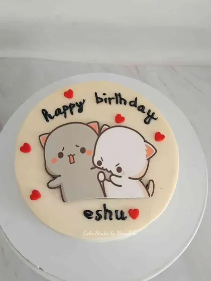 Another version of my cute, minimalist cat cake. This no-fondant design is perfect for someone who loves clean lines and adorable, hand-painted characters.