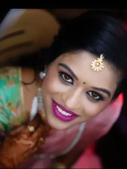 A beautiful, direct portrait of the bride, looking confident and radiant for her reception.