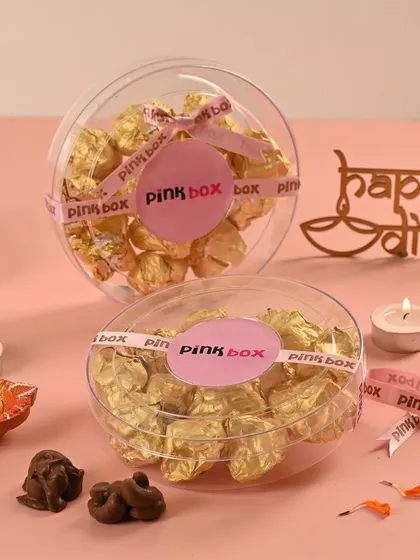 A closer look at our 'Zari & Chandi' chocolate rocks. These crunchy, nutty bites are individually wrapped, making them a perfect treat to share during Diwali.
