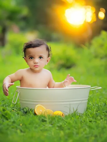 We also offer fun and creative concepts for outdoor shoots, like this adorable bubble bath setup. It's a unique way to capture playful moments with your little one.