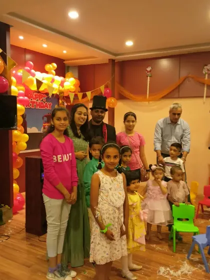 A lovely family photo after a birthday party performance. I am happy to pose with the birthday child and their family to capture the memory.