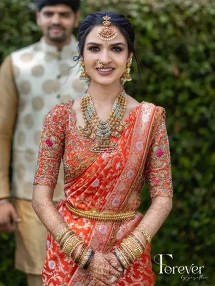 A happy, smiling portrait of the bride. The makeup is fresh and bright, perfectly capturing her joyful spirit on her wedding day.