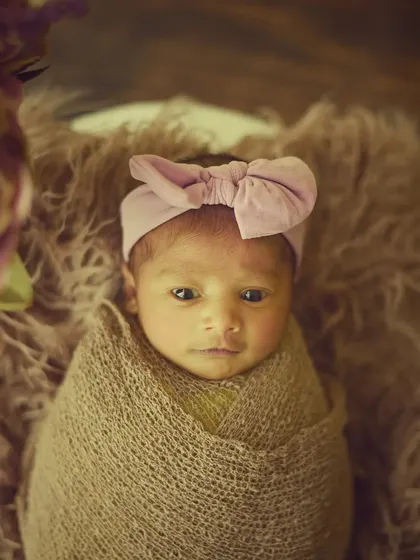 Another adorable awake moment, this little one is looking curiously at the camera.