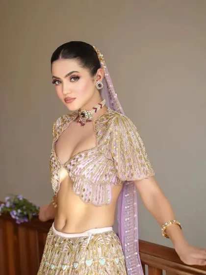 Another angle of the stunning Papa Don't Preach creation, highlighting the unique blouse design and the delicate craftsmanship.
