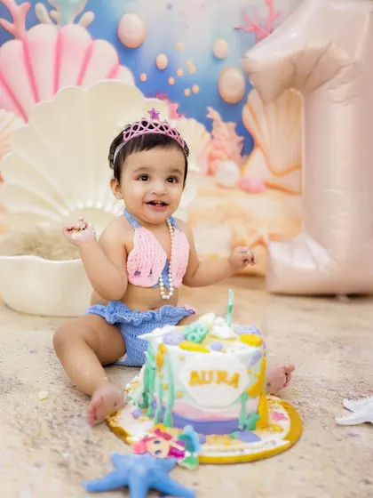A magical mermaid-themed cake smash to celebrate a very special first birthday. I love creating custom setups to make your baby's big day unforgettable.