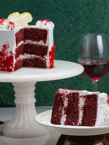 We celebrate love with our heart-shaped red velvet cake. The rich, crimson layers and classic cream cheese frosting are a timeless combination, making this a perfect and romantic choice for an anniversary or Valentine's Day.