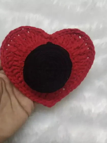 Bun it up with style. This is my red crochet heart scrunchie, a statement accessory that is sure to turn heads.