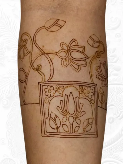 The initial outline of a lotus-themed armband. We start with a clear structure before filling in the details, ensuring a balanced and beautiful final design.