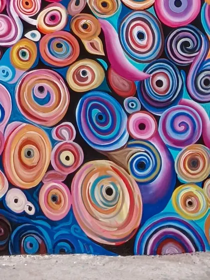 A final detail shot of the vibrant, swirling patterns from the Shishaverse cafe project.