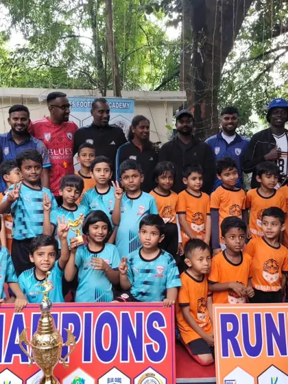 Sportsmanship is key. Here, our young players and coaches pose with the runners-up from BCFC, celebrating the efforts of all teams involved in the tournament.