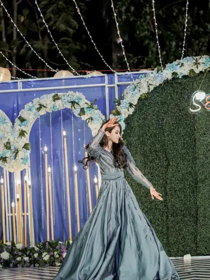 A graceful solo performance by a family member in a beautiful gown. I can choreograph for any style of outfit and music.