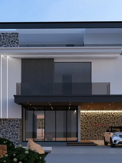 A modern villa design that combines white plaster, natural stone walls, and extensive glazing. The cantilevered upper floor and covered carport create a functional and visually layered exterior.