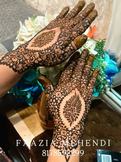 A full view of the symmetrical cutwork design on both hands.