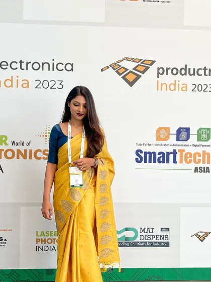 Posing against the backdrop at Electronica Productonica India 2023.