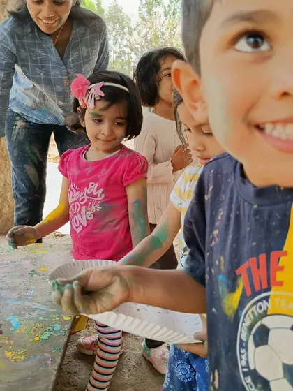 The pure joy of playing with colors during our Holi celebration at the farm. Messy play is happy play, and we embrace it fully.