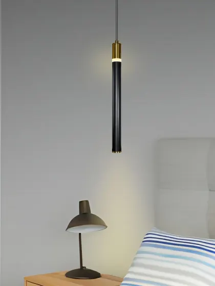 This slim pendant provides excellent focused light for bedside reading.