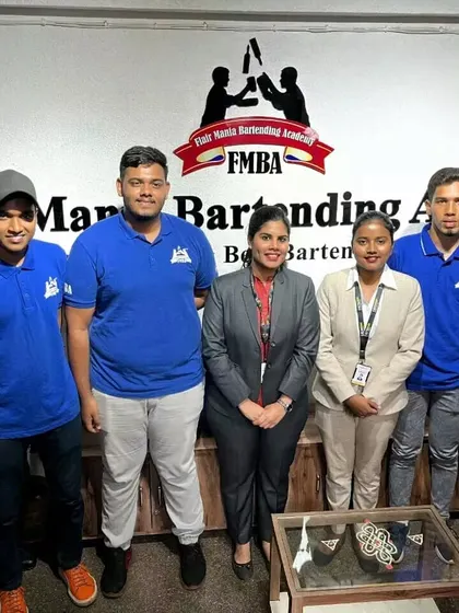 Students posing with industry professionals after a successful interview and placement session.