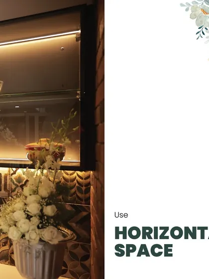 A tip for small spaces: use horizontal space wisely. This image shows how wall-mounted cabinets can provide storage without taking up valuable floor area.