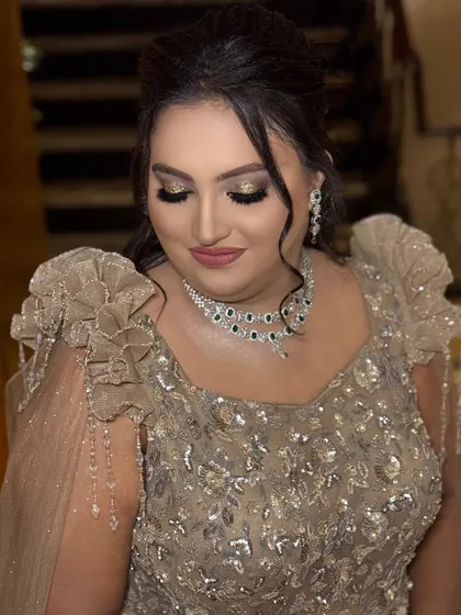The complete look, with soft waves in her hair and a flawless base. This is a great example of how I work with clients to create a cohesive style for their special events.