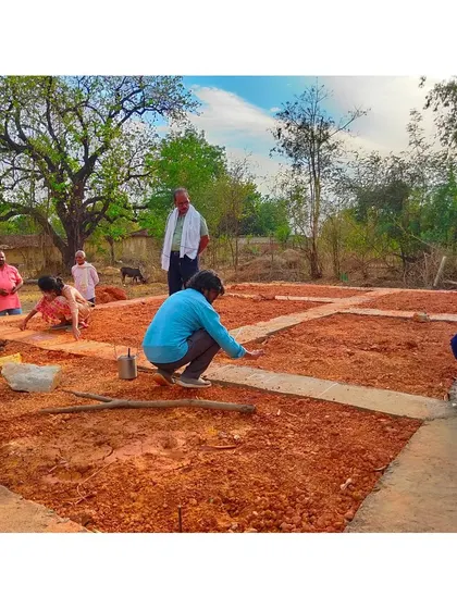 Every project begins with the community. Here, villagers and our team collaborate on marking the foundation for a new homestay, a crucial first step in our participatory design process where every voice contributes to the final outcome.