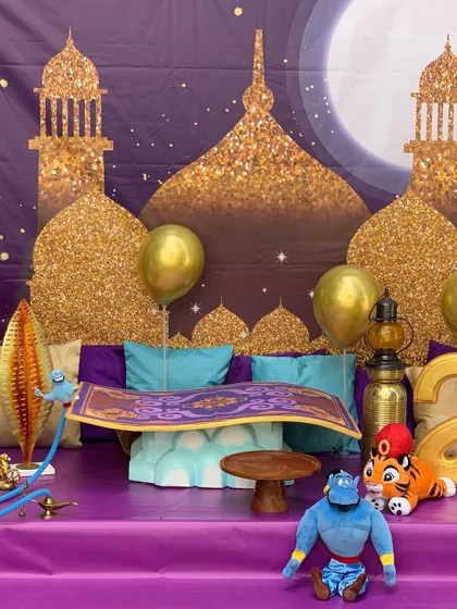 Let us take you to a whole new world with our Aladdin theme. This setup features a magic carpet cake stand, a glittering Agrabah backdrop, and character props.