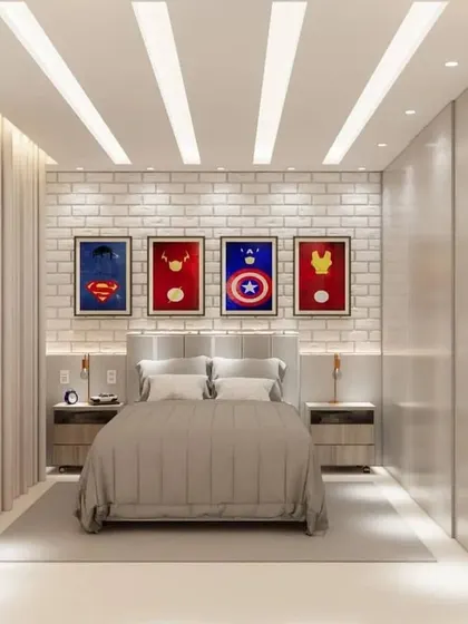 The bed in the superhero room, with minimalist posters of iconic heroes above the headboard.