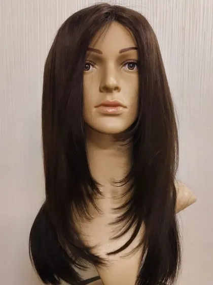 A mono base hairpiece with a beautiful layered cut. The monofilament top allows for natural movement and parting, blending seamlessly for a fresh-from-the-salon look.