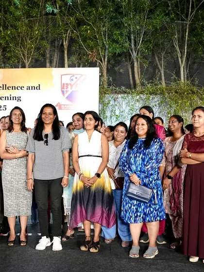 The mothers of our players participating in a fun game on stage. Their energy and spirit are infectious.