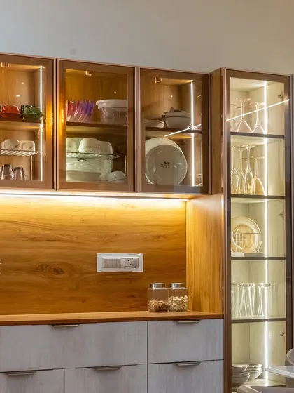 A closer look at the elegant crockery unit with integrated lighting, showcasing how I blend display and storage to create functional art within the home.