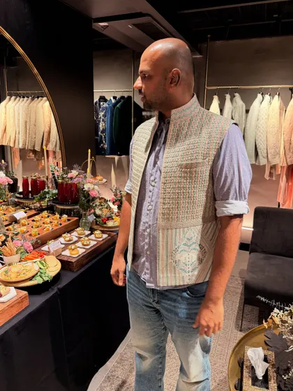 Another great menswear option from the designer preview. This textured bundi jacket paired with a simple shirt and jeans is a versatile look that works for both casual and semi-formal occasions.