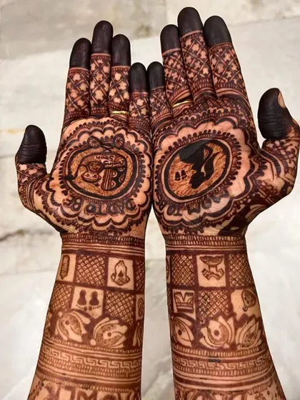 The beautiful dark stain of a baby shower mehendi. The contrast makes every little detail pop.