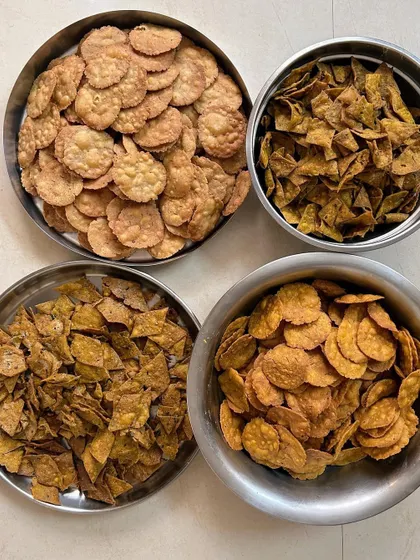 A variety of homemade mathris and puris. Each batch is made with fresh ingredients and traditional recipes, ensuring an authentic and delicious taste.