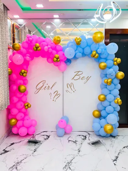 A full view of the stylish "Girl or Boy" backdrop, perfect for a modern gender reveal party.