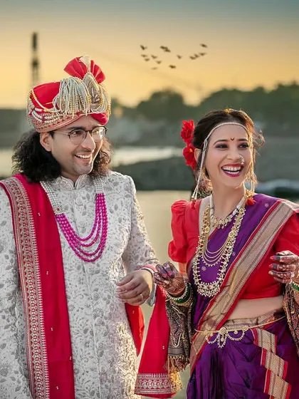 The laughter and joy of this couple is infectious. A beautiful, candid moment captured by the Ganga at sunset.