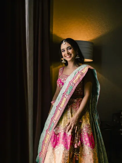 A happy and bright portrait of Vidushi. Her smile is infectious, and her makeup looks fresh and flawless.