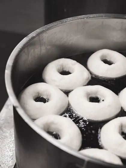 The essential step: boiling the bagels. This pre-cooks the exterior, setting the crust and giving our bagels their signature shine and chew.
